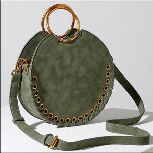 anthropologie melanie whipstitched round bag